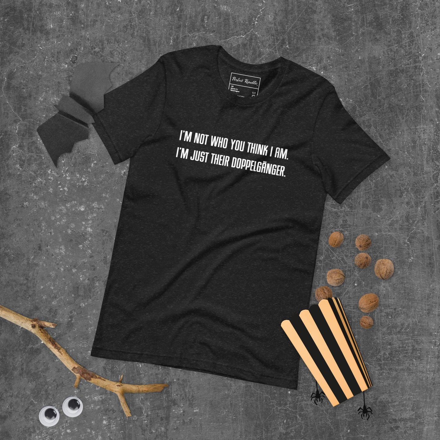 "I'M NOT WHO YOU THINK I AM. I'M JUST THEIR DOPPELGÄNGER." Unisex t-shirt